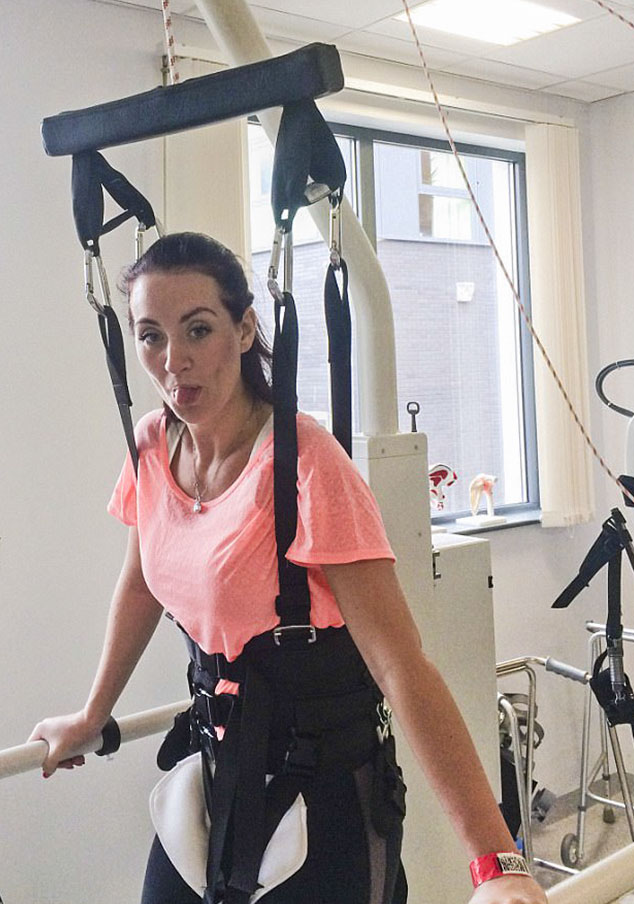 Woman overcomes paralysis, finds love with trainer
