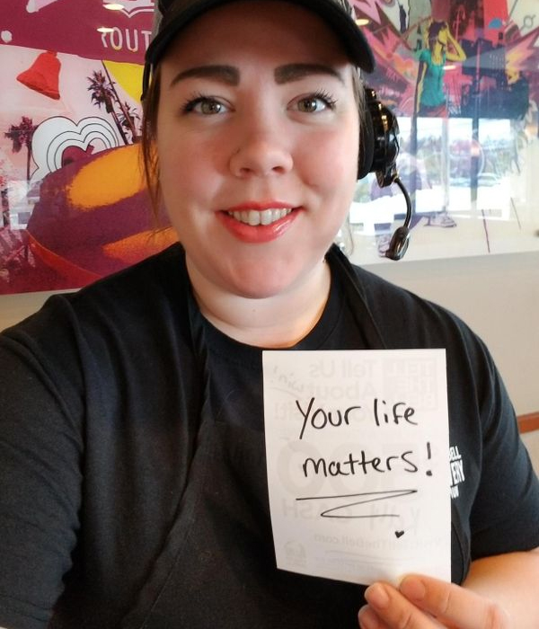 Worker Writes Uplifting Messages for Customers