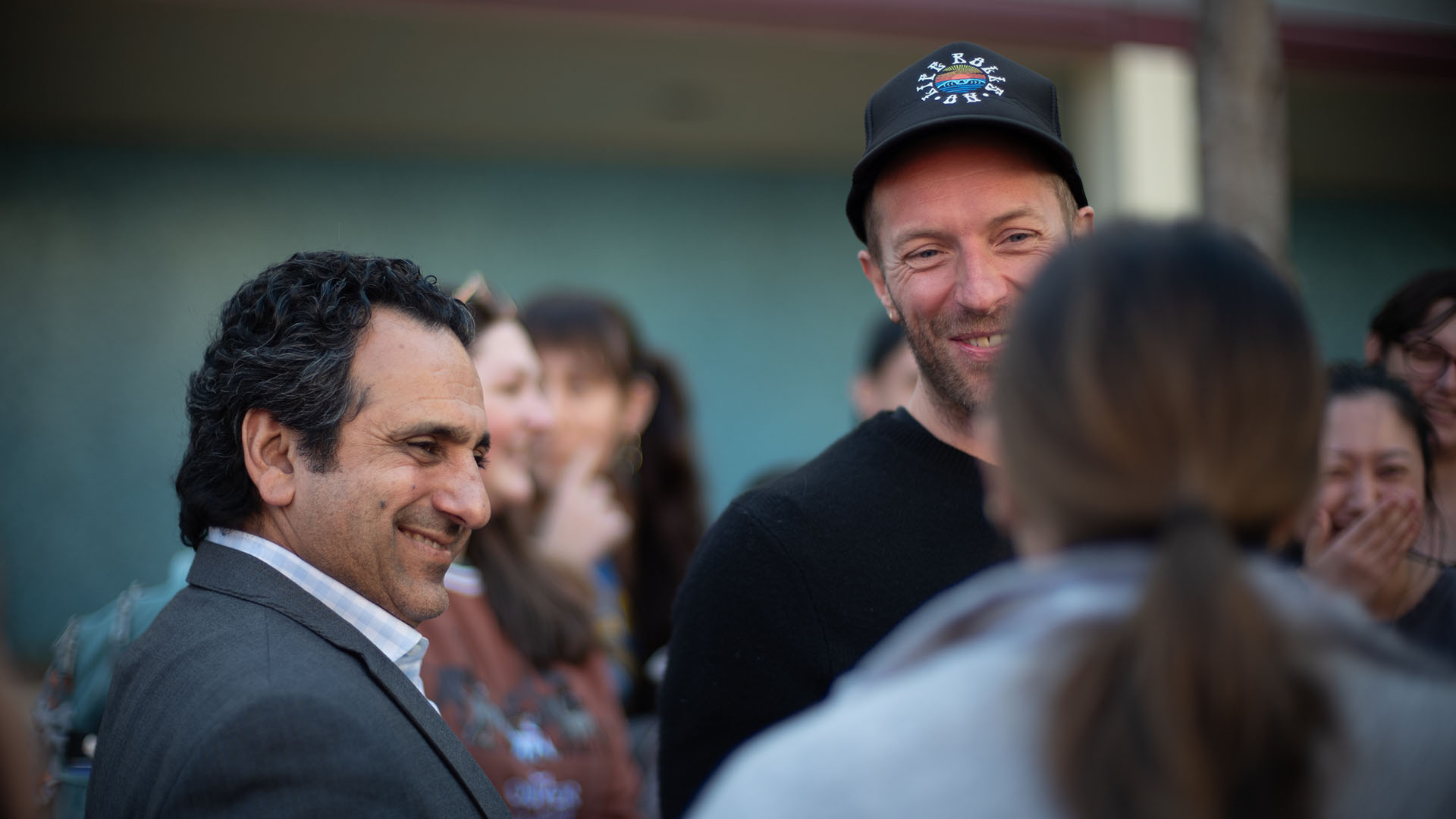 Love Button Founders and Chris Martin of Coldplay Visit Western University of Health Sciences for Love Button’s Integrative Medicine Research & Outreach Program